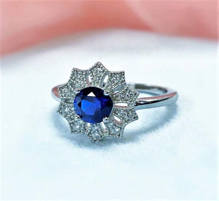 Flower Halo Blue CZ Ring in Sterling Silver