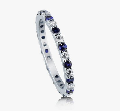 Simulated Blue Sapphire Pave Set CZ Eternity Ring in Sterling Silver