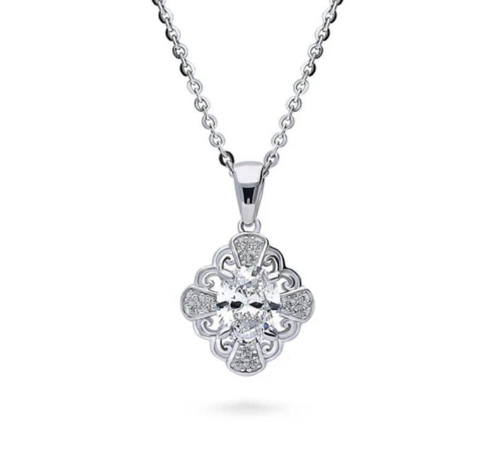 Halo Flower Oval CZ Pendant Necklace in Sterling Silver