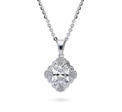 Halo Flower Oval CZ Pendant Necklace in Sterling Silver