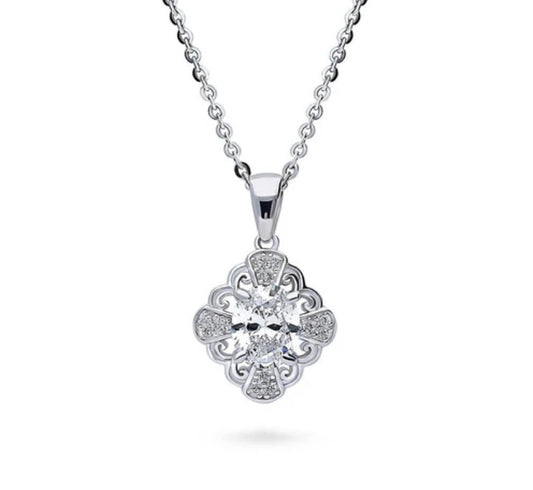 Halo Flower Oval CZ Pendant Necklace in Sterling Silver