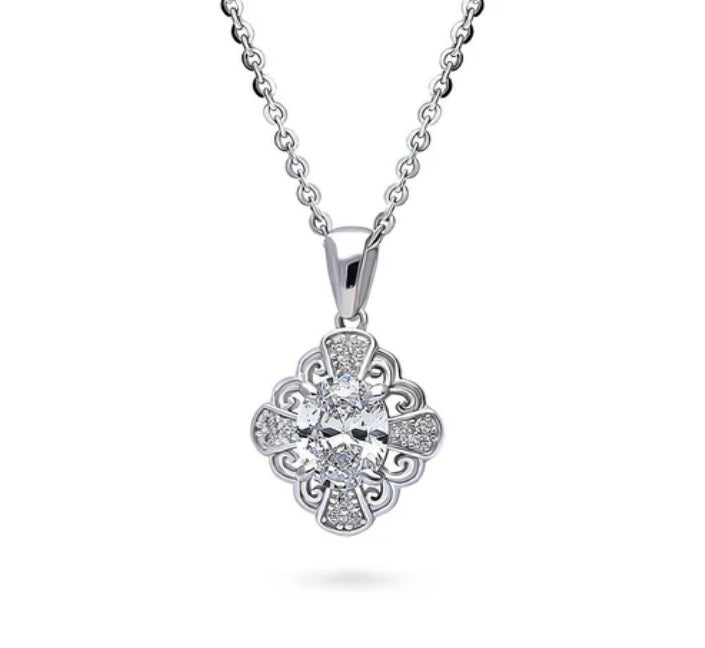 Halo Flower Oval CZ Pendant Necklace in Sterling Silver