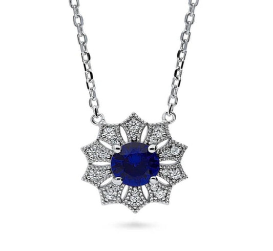 Halo Flower Blue Round CZ Pendant Necklace in Sterling Silver