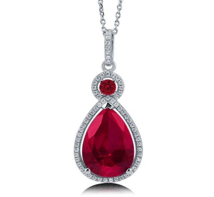 Halo Simulated Ruby Pear CZ Pendant Necklace in Sterling Silver