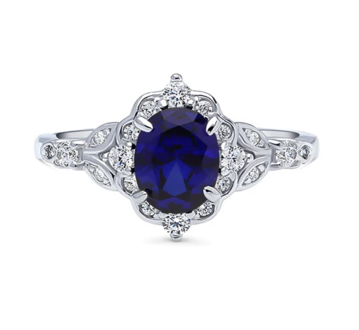 Halo Art Deco Simulated Blue Sapphire Oval CZ Ring in Sterling Silver