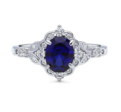 Halo Art Deco Simulated Blue Sapphire Oval CZ Ring in Sterling Silver
