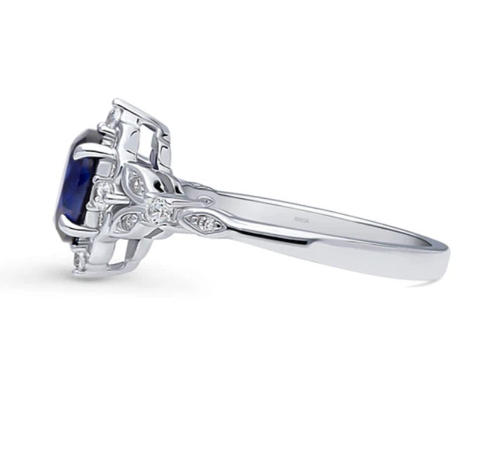 Halo Art Deco Simulated Blue Sapphire Oval CZ Ring in Sterling Silver