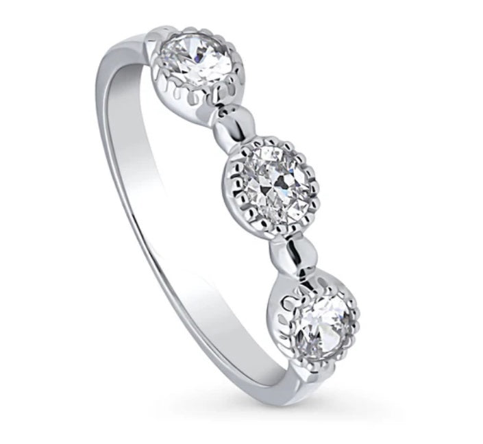 Milgrain Bezel Set Oval CZ Half Eternity Ring in Sterling Silver