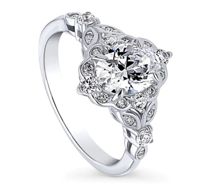 Halo Art Deco Oval CZ Ring in Sterling Silver