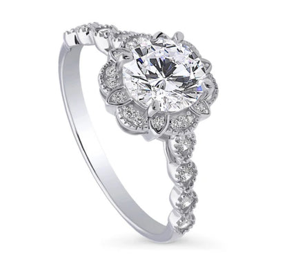 Halo Flower Round CZ Ring in Sterling Silver
