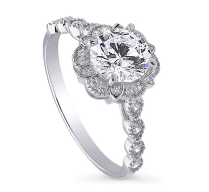Halo Flower Round CZ Ring in Sterling Silver