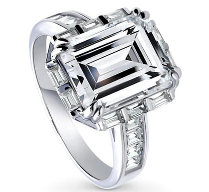 Halo Art Deco Step Emerald Cut CZ Ring in Sterling Silver